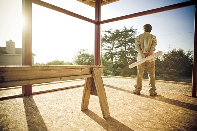 image of architect standing in an unfinished business